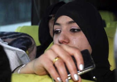 
An Iraqi woman is seen aboard a bus bound for Iraq, prior to its departure from Damascus on Tuesday. Associated Press
 (Associated Press / The Spokesman-Review)