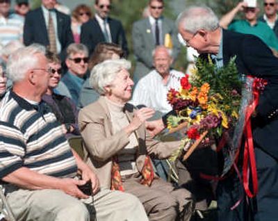 
In 1998, Gov. Phil Batt presented Louise Shadduck with flowers after the surprise announcement that the new Idaho Department of Lands building  would be named after her. 
 (File / The Spokesman-Review)
