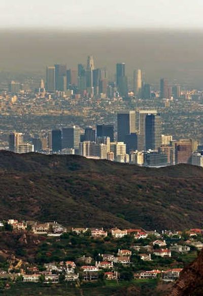 
Los Angeles sits under  smog in this January  2000 file photo.  EPA Administrator Stephen  Johnson recommended tighter pollution standards  Thursday. Associated Press
 (Associated Press / The Spokesman-Review)