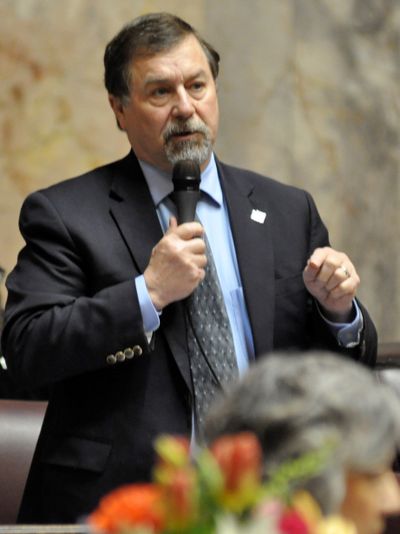 OLYMPIA – Sen. Mark Schoesler, R-Ritzville, urged lawmakers to vote against the $70 billion State Operating Budget, in part because he said it “squanders” money on studying Snake River dam removal. The Senate passed the budget 37-12.  (By Jim Camden / For The Spokesman-Review)