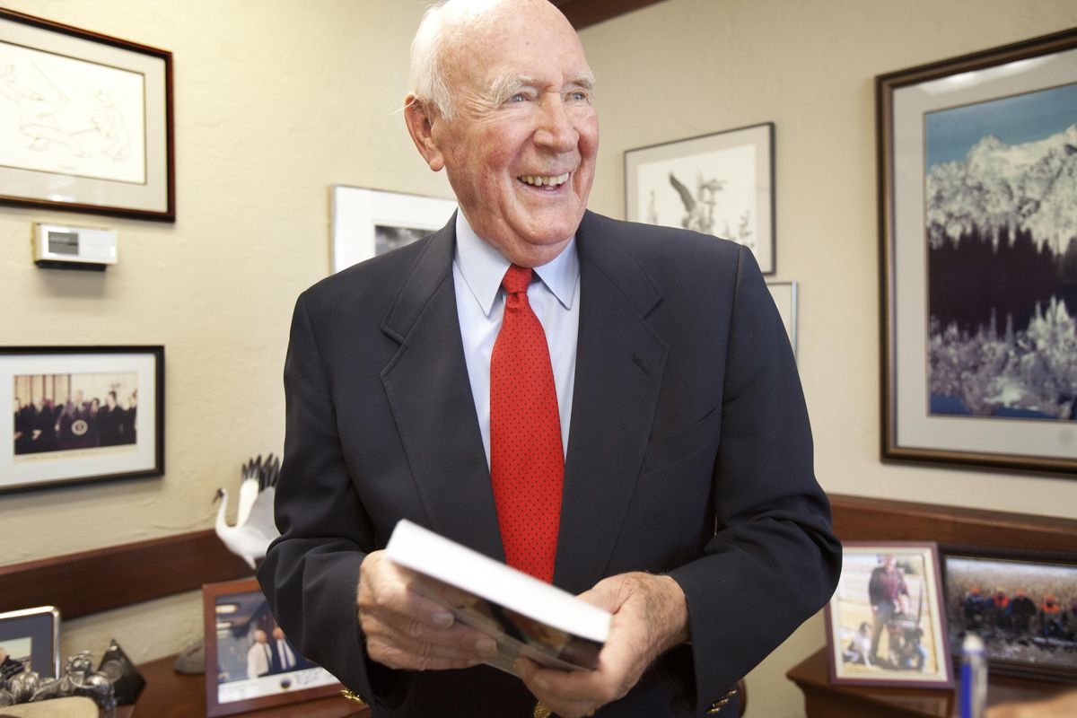 In this Oct. 14, 2001, file photo, former Interior Secretary Cecil V. Andrus smiles at his office in Boise, Idaho. (Katherine Jones / AP)