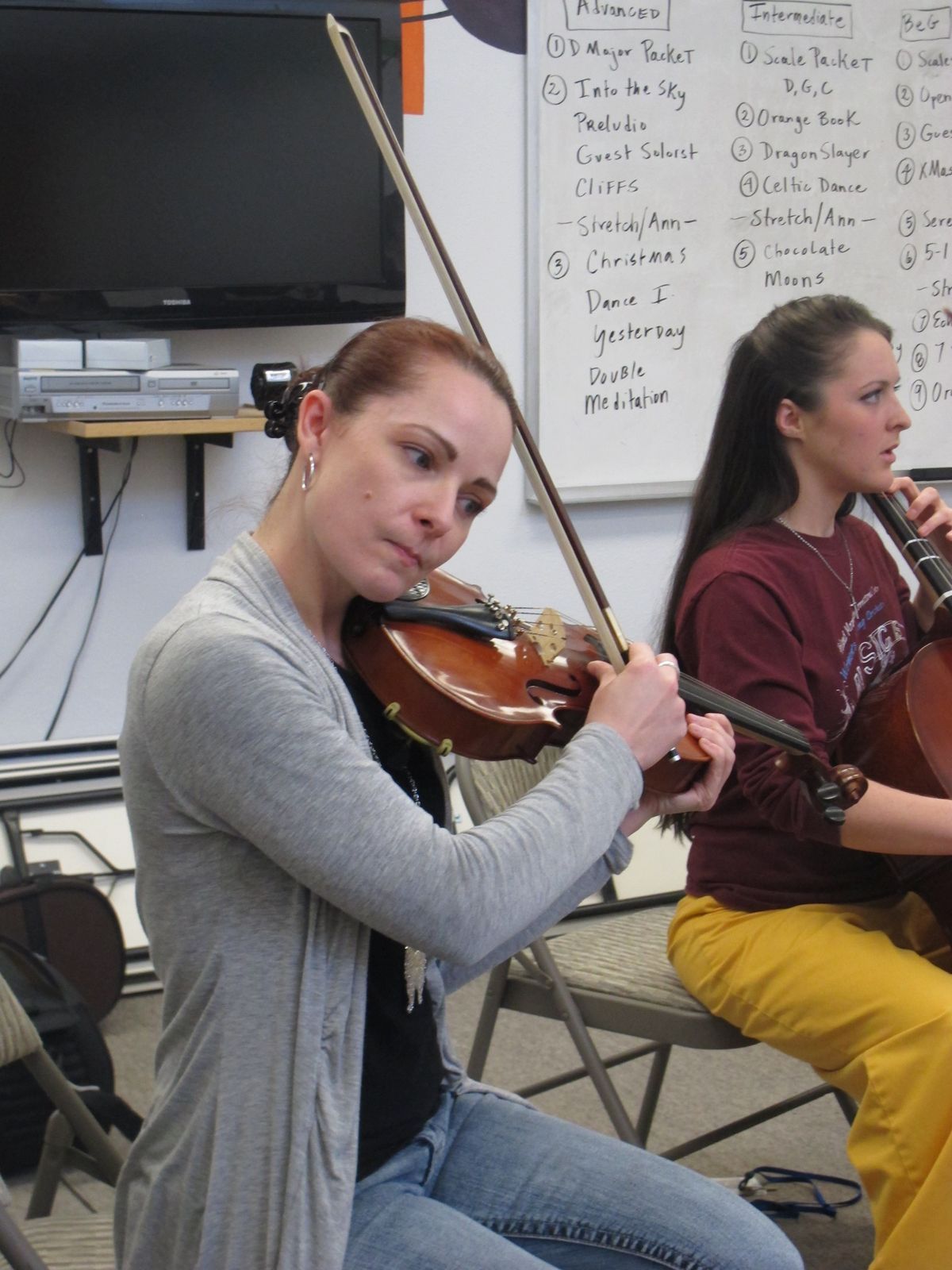 In this Nov. 17, 2012, photo, Sarah Jane Coffman practices the viola with the Hiland Mountain Correctional Facility Orchestra in Eagle River, Alaska. After serving a 14-year sentence for murder, Sarah Jane Coffman, a founding member of the women's string orchestra at the prison in 2003, will debut as a citizen member when the two annual holiday concerts are held Dec. 8, 2012. (Mark Thiessen / Associated Press)