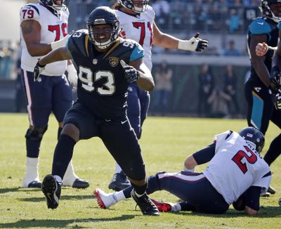 Calais Campbell (93) was traded from the Jacksonville Jaguars to the Baltimore Ravens for a fifth-round draft pick on Sunday. (Stephen B. Morton / Associated Press)
