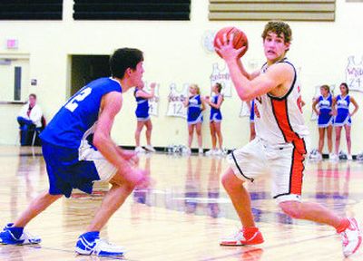 
West Valley junior Bryan Peterson, right, leads the Great Northern League in scoring at 17.3 points per game. 
 (Ingrid Lindemann / The Spokesman-Review)
