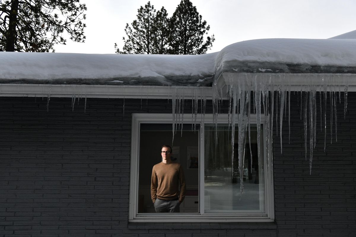 Alex May poses for a photo in his South Hill home on  March 1 in Spokane. May is trying to clear the home’s deed of a racial covenant barring anybody who isn’t white from purchasing the house. The covenant is no longer legally enforceable, but May still wants it cleared. (Tyler Tjomsland / The Spokesman-Review)