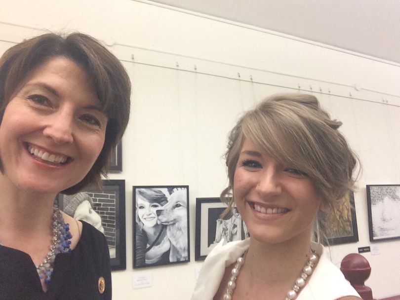 Cathy McMorris Rodgers poses with 2014 Congressional Art Contest winner, Haley Madison, who was a senior at East Valley High School. 