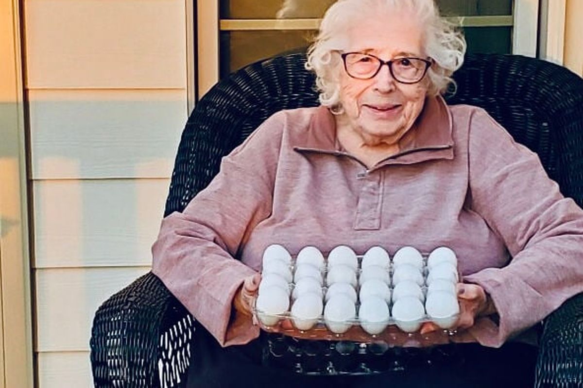 Mary Foss Starn, with a container of fresh eggs, said she had given up on hearing from anyone after she put several signed eggs into cartons 72 years ago. MUST CREDIT: Laurie Bascom.  (Laurie Bascom/Handout)