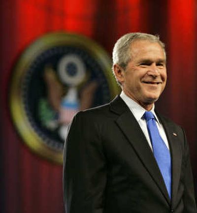 
President Bush arrives to speak Wednesday at his yearly fundraising dinner. Associated Press
 (Associated Press / The Spokesman-Review)
