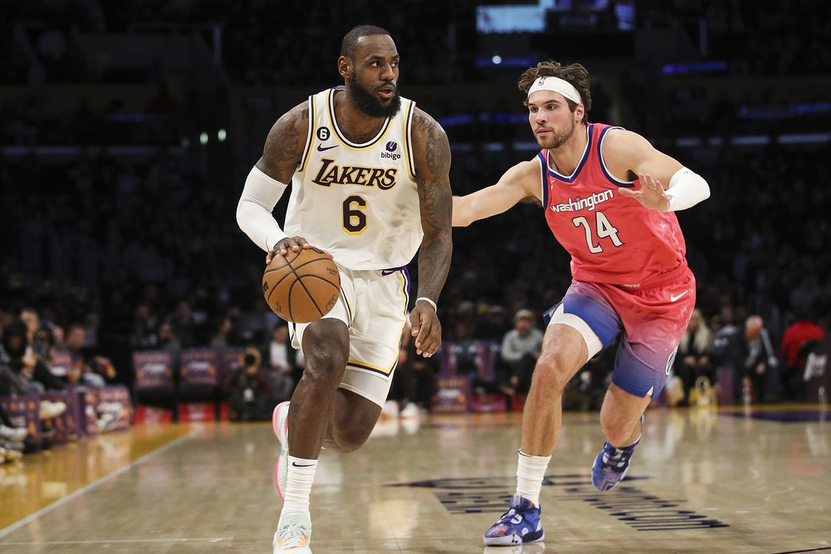 Washington’s Corey Kispert defends Los Angeles’ LeBron James during a Dec. 18 game at Crypto.com Arena. Two years since being drafted with the 15th pick, Kispert says he feels much more comfortable guarding at the NBA level.  (Tribune News Service)