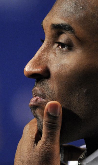 Kobe Bryant looks like he’s all business during news conference after practice Wednesday. (Associated Press / The Spokesman-Review)
