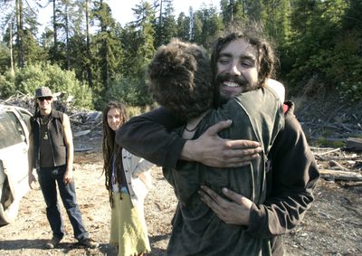 Nadia Berg and Billy Stoetzer embrace before leaving the Nanning Creek grove near Scotia, Calif., last week.  (Associated Press / The Spokesman-Review)