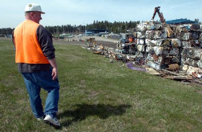
Roger Saterfiel, Kootenai County's solid-waste program director, walks past bundles of scrap metal at the Ramsey Road transfer station in Coeur d'Alene on Friday. The county hopes to soon start a free computer monitor recycling program paid for by scrap-metal sales.
 (Jesse Tinsley / The Spokesman-Review)