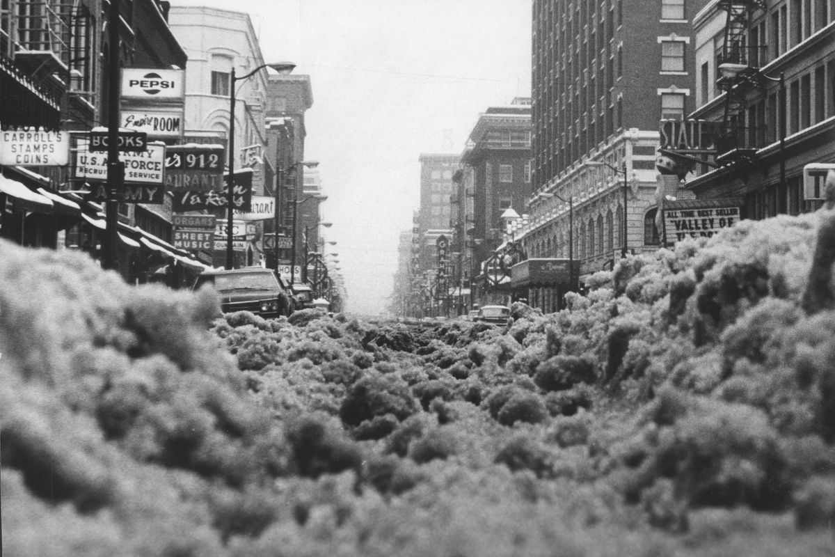 In January 1969, Spokane was well on its way to having a record snowfall. On Feb. 1, 1969, The Spokane Daily Chronicle reported that Spokane lead the United States in depths of snow with 42 inches. This picture was taken on Sprague Avenue facing east. (PHOTO ARCHIVE / SR)