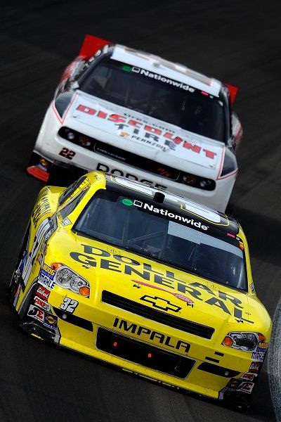 Mark Martin passes Brad Keselowski on the last lap to win the Sam's Town 300 at Las Vegas Motor Speedway. (Photo Credit: Jared C. Tilton/Getty Images for NASCAR) (Jared Tilton / Getty Images North America)