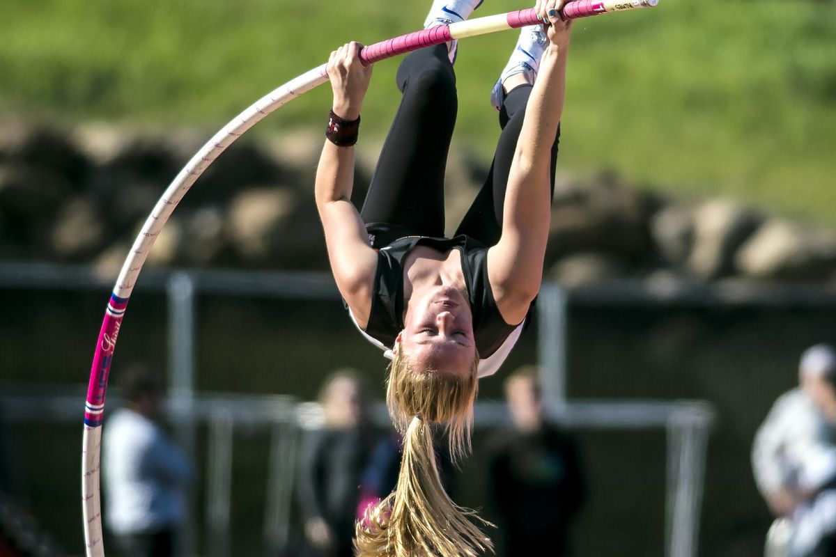 In the 1A girls pole vault, Elli Kimes of Cashmere vaults to a state record of 13-1/2 Friday at Eastern Washington University. (Colin Mulvany / The Spokesman-Review)