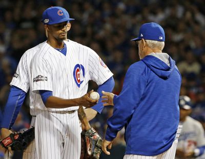 Chicago Cubs manager Joe Maddon used three relievers, including Carl Lewis, in the seventh inning of Game 1 of the NLCS. (Nam Y. Huh / Associated Press)
