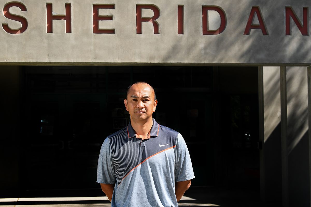 Larry Quisano, Sheridan Elementary principal, stands in front of the school last summer.  (Tyler Tjomsland/THE SPOKESMAN-REVIEW)