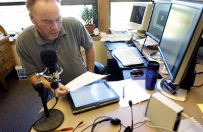 
Montana Tech University professor David Hobbs reads from his script as he records a podcast in his office on Sept. 28. 
 (Associated Press / The Spokesman-Review)