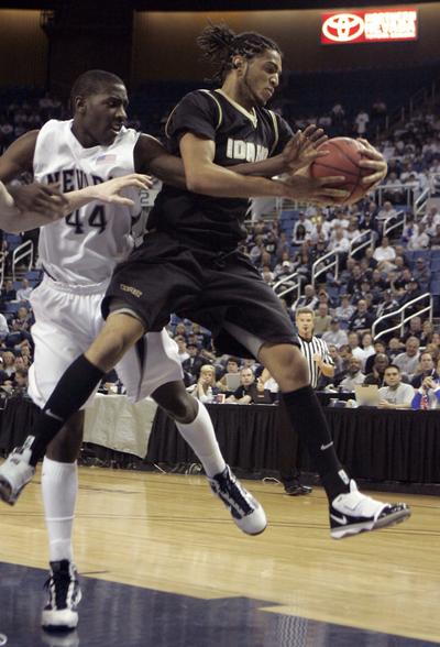 Idaho's De Souza Luciano, right, pulls a rebound away from Nevada's Dario Hunt during the first half of an NCAA college basketball game  at the Western Athletic Conference tournament in Reno, Nev., Thursday, March 11, 2010. (Rich Pedroncelli / Associated Press)