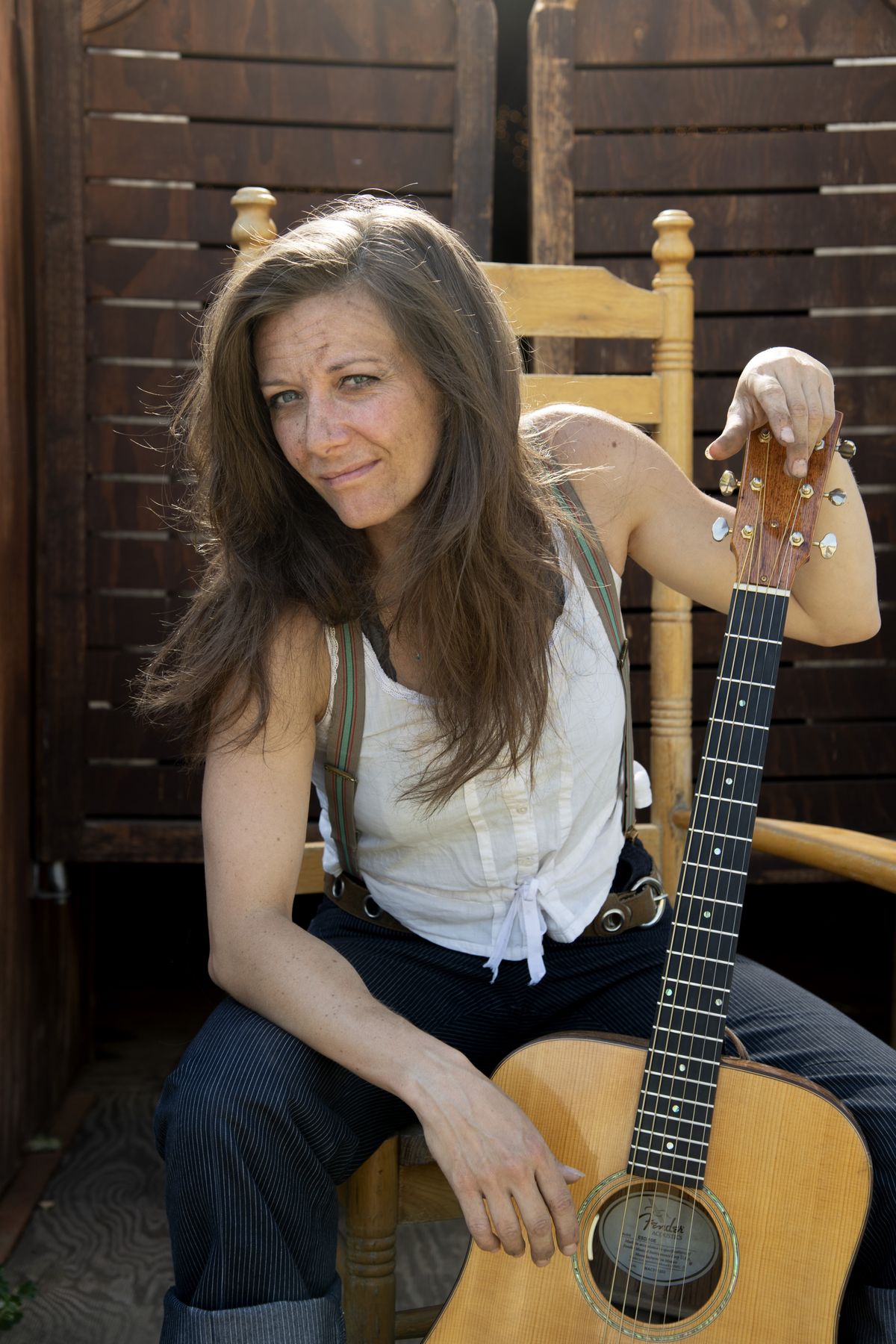 Singer-songwriter Olivia Brownlee sits for a photo at Rockin' B Ranch, a western-themed dinner theater owned by her parents, in Liberty Lake on Tuesday. (Jesse Tinsley/The Spokesman-Review)