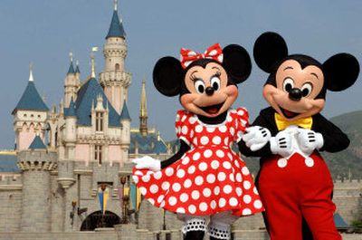 
Mickey and Minnie pose at Sleeping Beauty's Castle in Hong Kong Disneyland which opened Monday.
 (Associated Press / The Spokesman-Review)