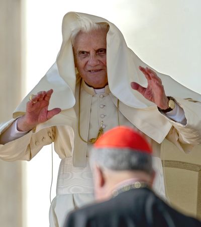 ORG XMIT: AJM105 Pope Benedict XVI's cloak is lifted by the wind during his weekly general audience in St. Peter's Square, at the Vatican, Wednesday, Oct. 21, 2009. (AP Photo/Andrew Medichini) (Andrew Medichini / The Spokesman-Review)