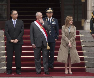 Peru Shining Path
Rodrigo Abd
AP
AP
FILE - In this Sept. 12, 2017  photo, Peru's President, Pedro Pablo Kuczynski, center, gestures during a ceremony commemorating 25 years of the capture of Shining Path leader Abimael Guzman, outside the National Palace in Lima, Peru. (Rodrigo Abd / Associated Press)