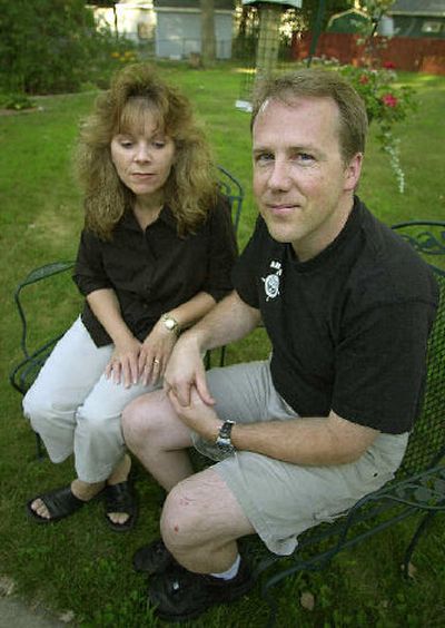 
Northwest Airlines mechanic Joe Wagner, right, and his wife, Colleen, contemplate their future at their home in Coon Rapids, Minn. Wagner, a Northwest mechanic for more than 15 years, has spent the last two of them looking around for his next career. 
 (Associated Press / The Spokesman-Review)