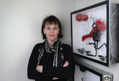 Elizabeth Collier creates art in her North Side  home and places it into shadow boxes.  (Dan Pelle / The Spokesman-Review)