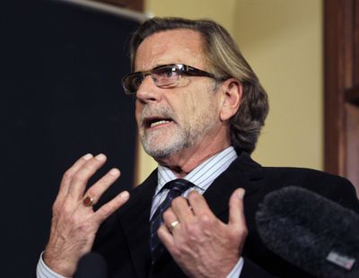 Attorney John Henry Browne talks to reporters Thursday in Seattle. Browne will be representing the U.S. soldier accused of killing 16 Afghan civilians. (AP/Ted S. Warren)