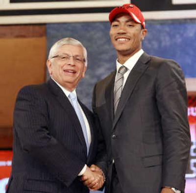 
No. 1 picks Derrick Rose takes the spotlight with commissioner David Stern. Associated Press
 (Associated Press / The Spokesman-Review)