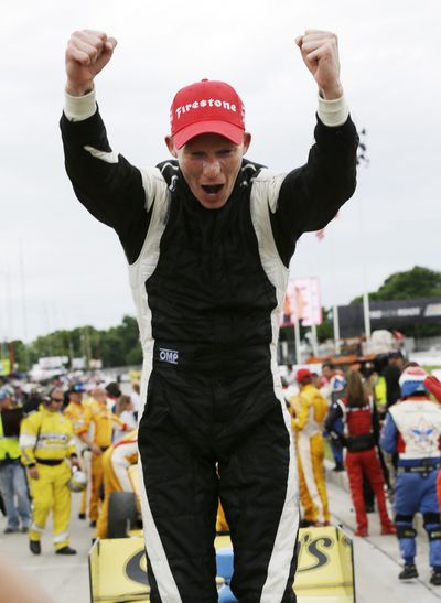 Mike Conway celebrates after a record-breaking victory. (Associated Press)