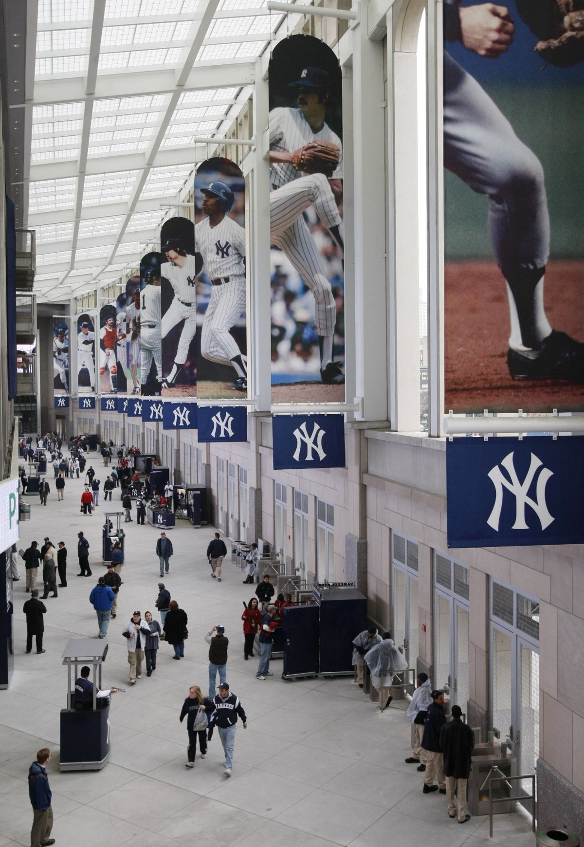 Fans mill about as they get their first glimpse of the Great Hall before the New York Yankees exhibition baseball game against the Chicago Cubs at the new Yankee Stadium on Friday.  (Associated Press / The Spokesman-Review)