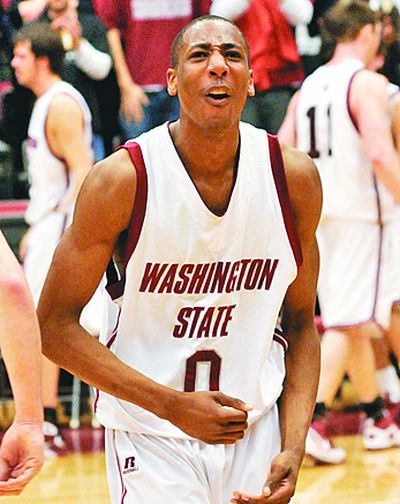 Washington State’s Marcus Capers celebrates their 69-53 win over (Randy Hayes / The Spokesman-Review)