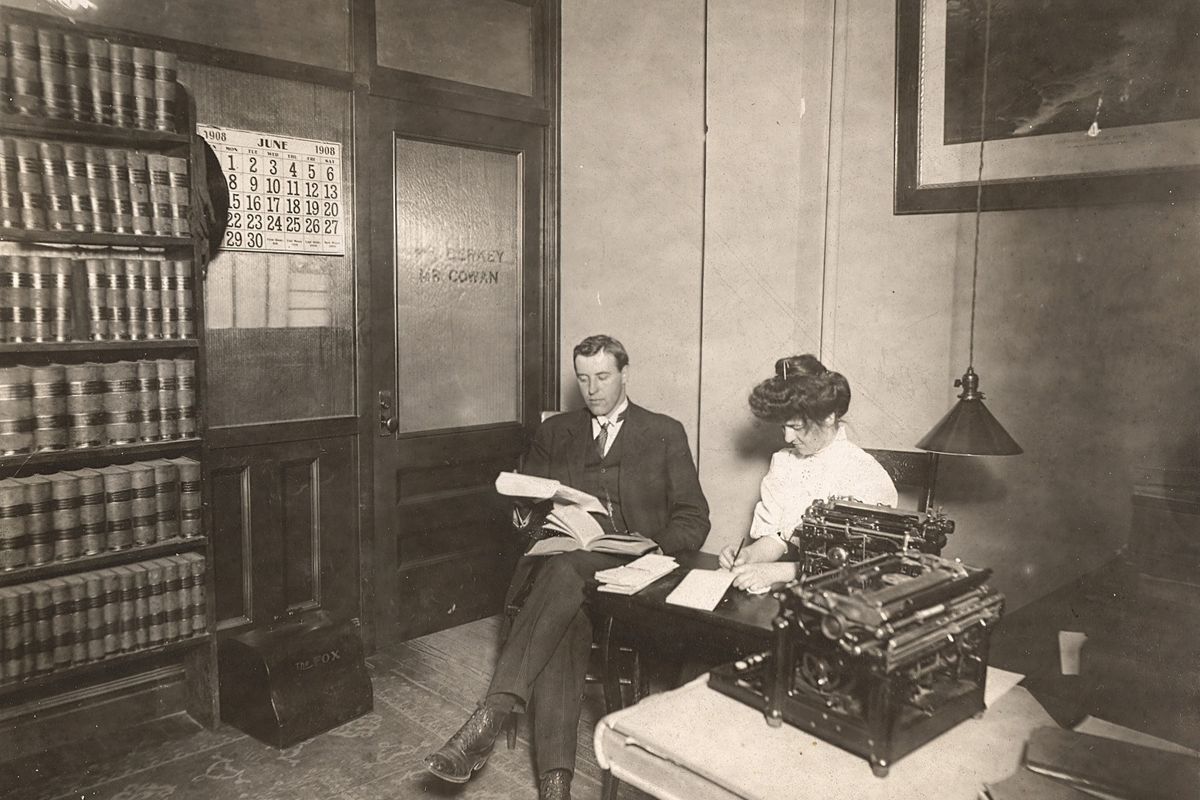 This photo shows Charles “Fred” Cowan, a Spokane attorney with his secretary, unidentified, in his law office in the Columbia Building in June 1908. The Columbia Building was erected in 1906. It’s also known in modern times as the James S. Black building.