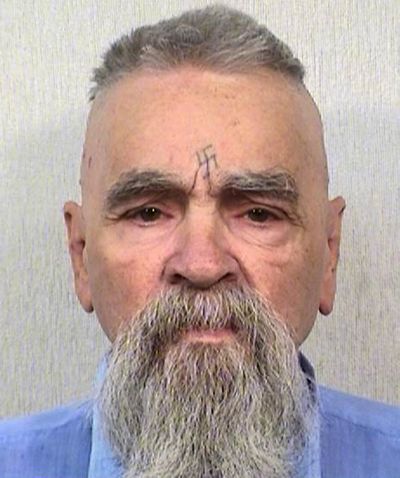This Oct. 8, 2014, file photo provided by the California Department of Corrections and Rehabilitation shows serial killer Charles Manson. California prison official says cult killer Manson is alive following reports that he was hospitalized on Tuesday, Jan. 3, 2017. (California Department of Corrections and Rehabilitation)