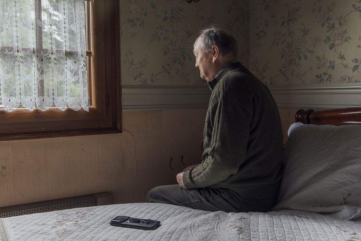 Presles-en-Brie homeowner Bernard Weisse looks at cracks in a bedroom wall of his village home on the outskirts of Paris on June 2. (Cyril Marcilhacy/Bloomberg)