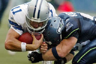 
Dallas QB Drew Bledsoe, left, has thrown 10 touchdowns vs. three interceptions. 
 (Associated Press / The Spokesman-Review)