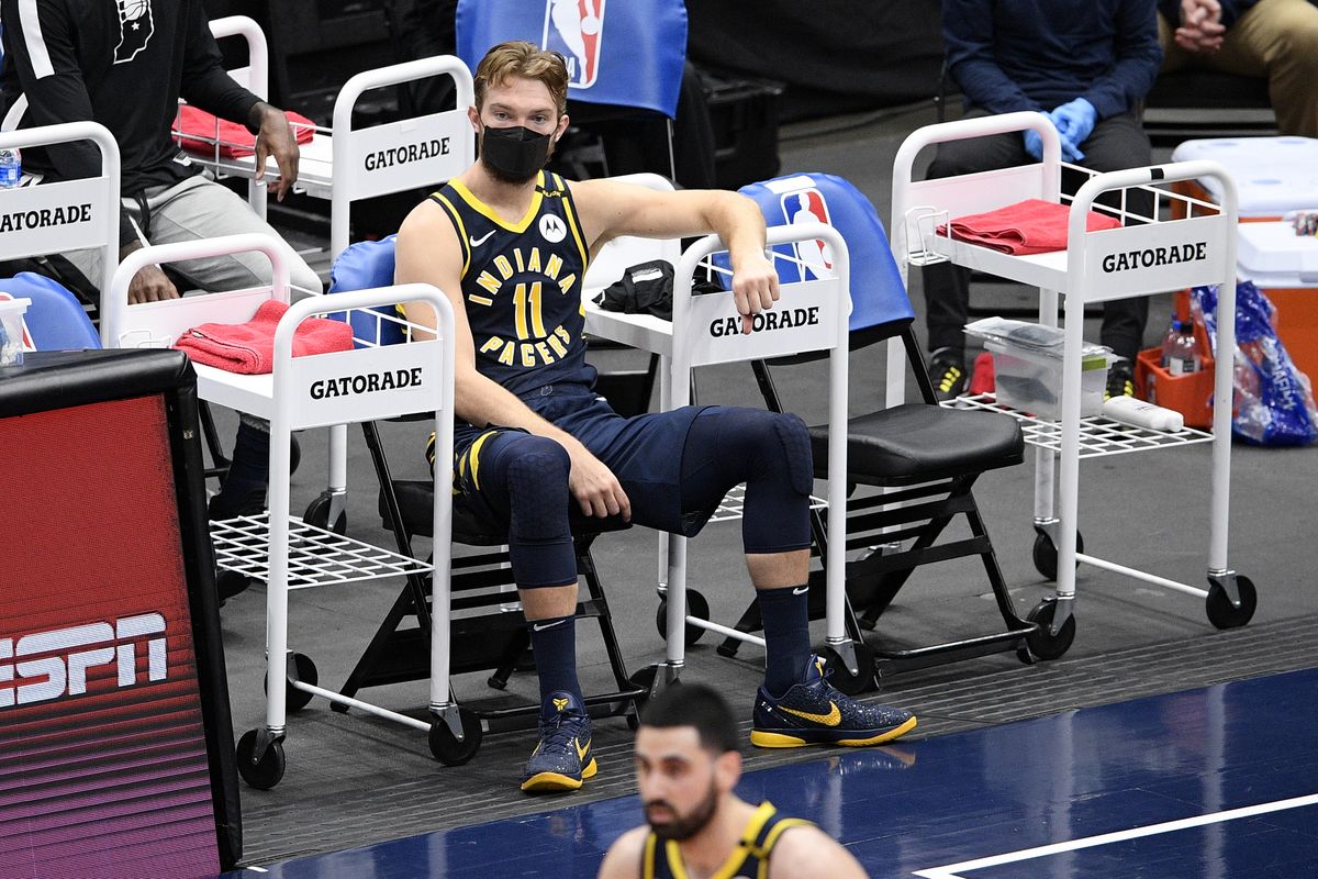 Indiana Pacers forward Domantas Sabonis (11) watches from the bench area during the second half of an NBA basketball Eastern Conference play-in game against the Washington Wizards, Thursday, May 20, 2021, in Washington. The Wizards won 142-115. (Associated Press)
