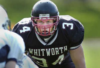 
Whitworth linebacker Casey Clifton zeroes in on Wisconsin-Stout quarterback Tanner Kattre. 
 (Christopher Anderson / The Spokesman-Review)