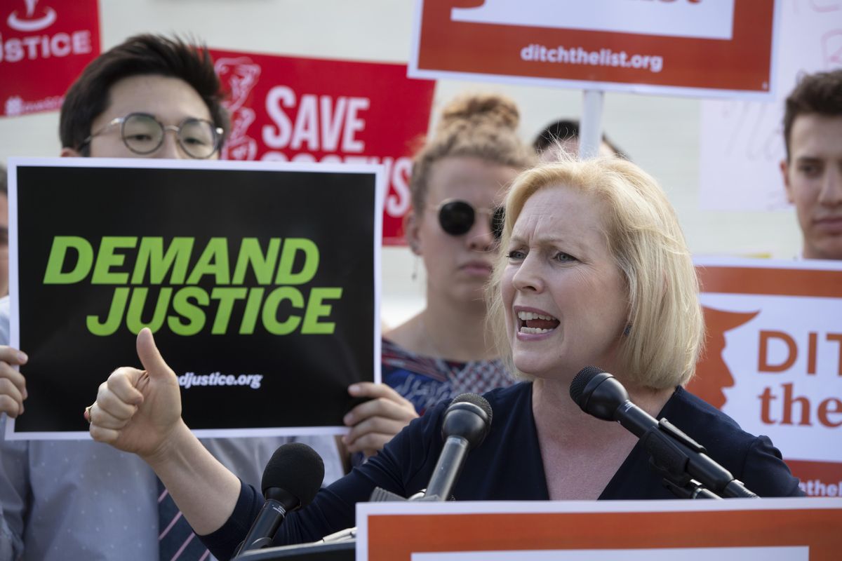 Sen. Kirsten Gillibrand, D-N.Y., joins activists at the Supreme Court as President Donald Trump prepares to choose a replacement for Justice Anthony Kennedy, June 28, 2018, in Washington. Several prominent Democrats who are mulling a bid for the White House in 2020 sought to bolster their progressive credentials this week by calling for major changes to immigration enforcement, with some pressing for the outright abolition of the federal governments chief immigration enforcement agency. Gillibrand has said Immigration and Customs Enforcement, known as ICE, has become a deportation force. (J. Scott Applewhite / Associated Press)