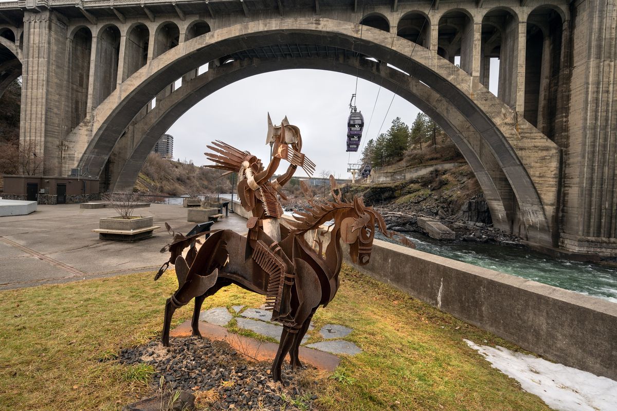 Virgil “Smoker” Marchand, a member of the Colville Tribe, created many public art pieces in the Northwest. His most iconic work is The Salmon Chief, which stands next to Spokane Falls in Huntington Park. It represents the tradition of salmon chiefs who regulated fishing on the river. The sculpture was made for the park’s dedication in 2014.  (COLIN MULVANY/THE SPOKESMAN-REVIEW)