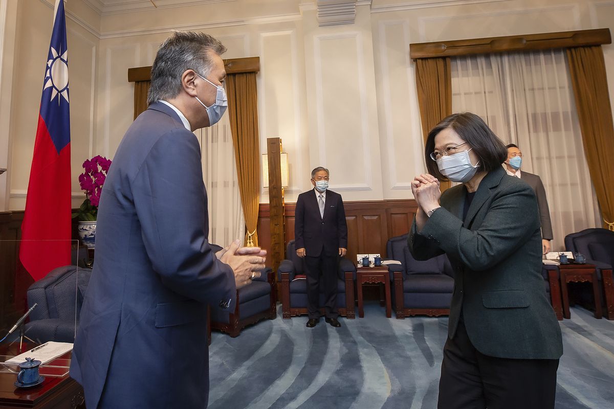 In this photo released by the Taiwan Presidential Office, U.S. Representative Mark Takano, D-Calif. left is greeted by Taiwanese President Tsai Ing-wen at the Presidential Office in Taipei, Taiwan on Friday, Nov. 26, 2021. Five U.S. lawmakers met with Taiwan President Tsai Ing-wen Friday morning in a surprise one-day visit intended to reaffirm the United States