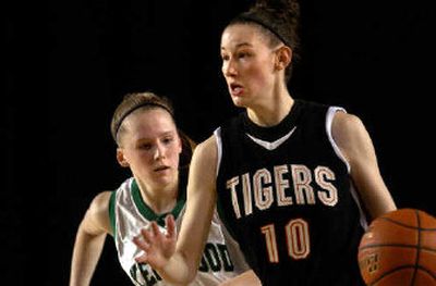 
Katelan Redmon saved her best moments while helping Lewis and Clark to two State 4A titles. 
 (File / The Spokesman-Review)