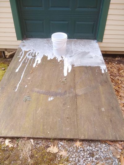 This is a ramp to a shed made from treated plywood. It’s being cleaned with certified organic oxygen bleach. (Tim Carter)