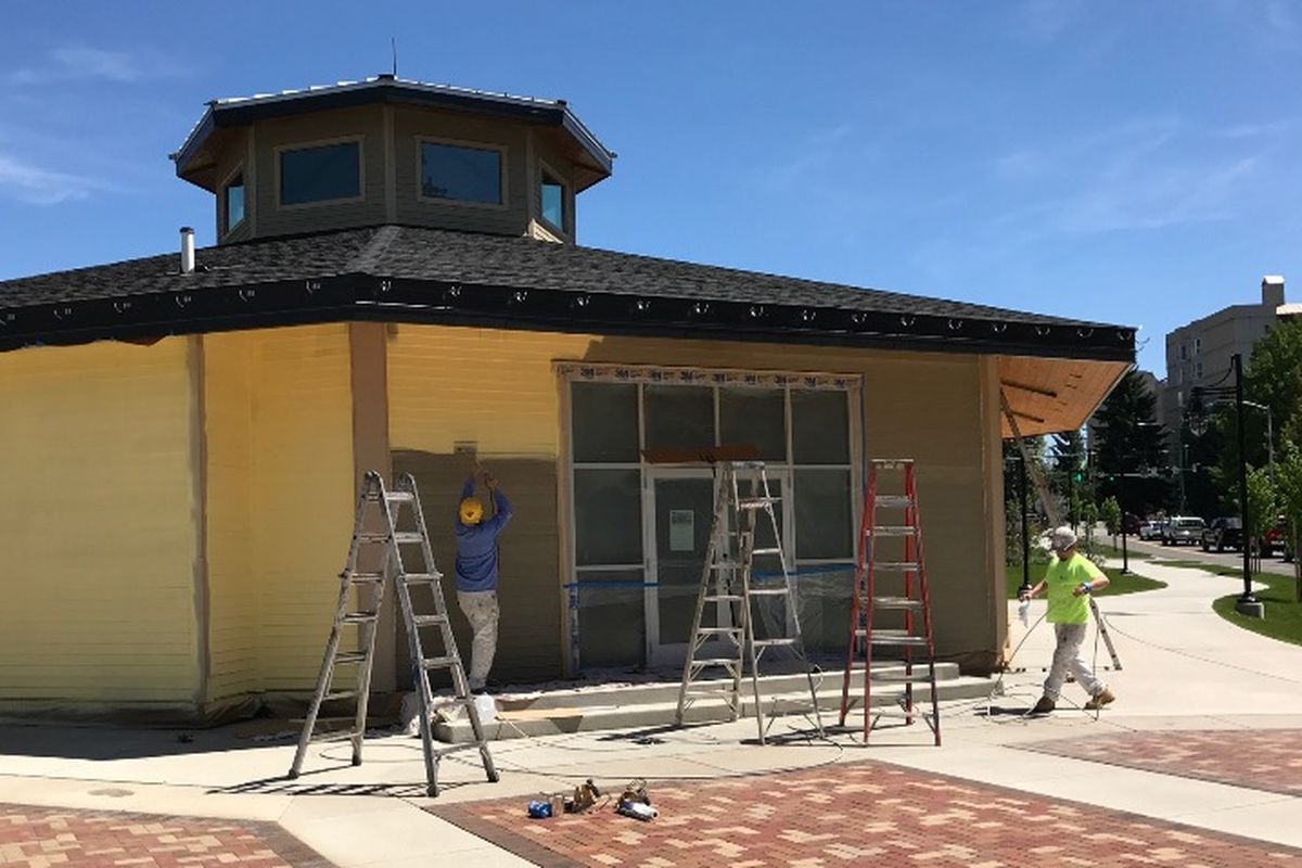 Painters were applying yellow pain to the western wall of the back-to-the future Coeur d