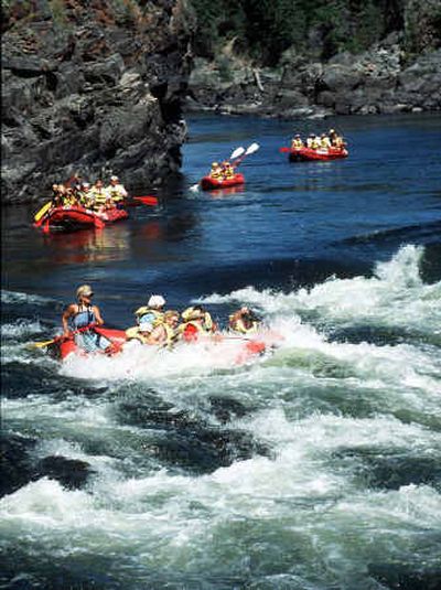 
A group of Riverview Retirement Community senior citizens ranging from 70 to 90 years old head into their final dose of whitewater during a rafting trip down the Clark Fork River. 
 (The Spokesman-Review)