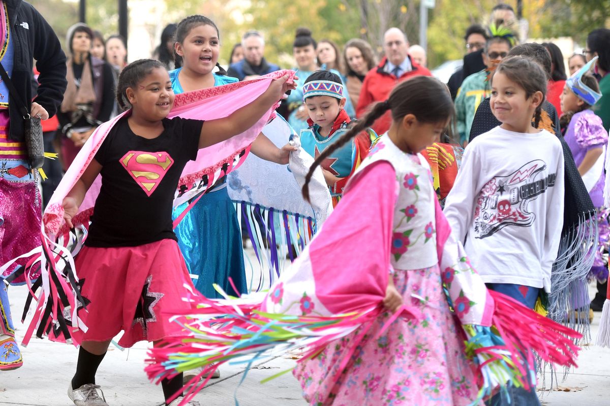 A group of young dancers dance, Monday, Oct. 10, 2016, outside Spokane City Hall at a celebration for the first Indigenous Peoples’ Day in Spokane. Earlier this year, the Spokane City Council voted to rename the venerable Columbus Day holiday as “Indigenous Peoples Day.” (Jesse Tinsley / The Spokesman-Review)