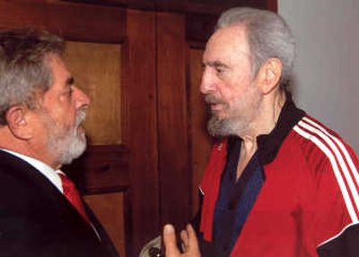 
Fidel Castro speaks with Brazil's President Luiz Inacio Lula da Silva in Havana on Tuesday. Observers say there is a good chance Castro will not be re-elected as Cuba's president.
 (The Spokesman-Review)