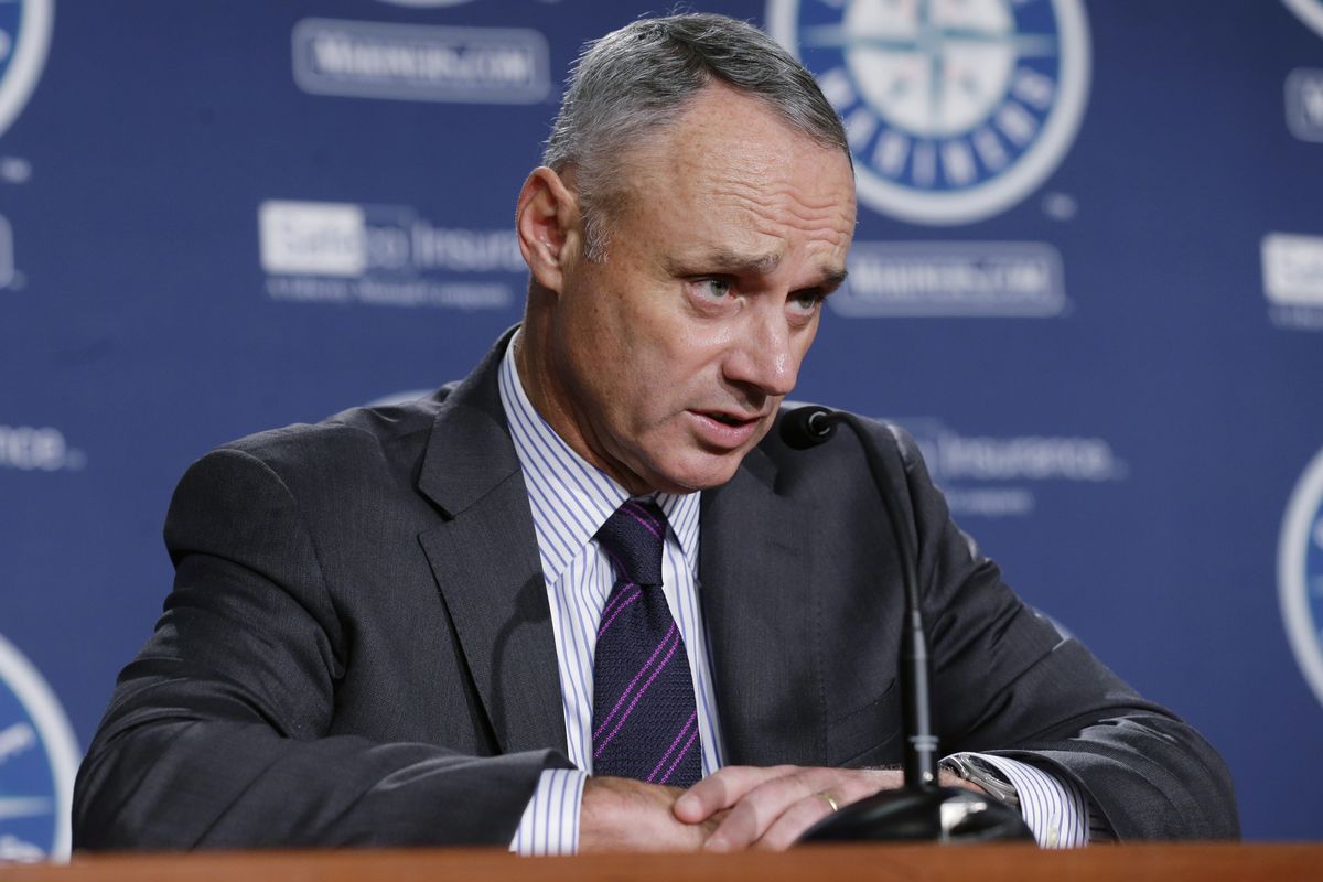 Baseball commissioner Rob Manfred met the media before Wednesday’s game in Seattle. (Associated Press)